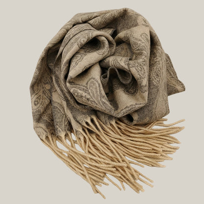 Pure cashmere paisley scarf in natural brown displayed in a folded drape. Highlights the lightweight hand feel, woven paisley pattern, and luxurious Inner Mongolian cashmere quality.