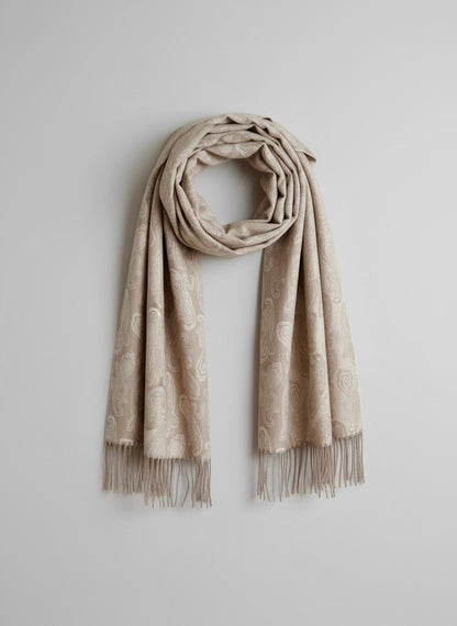 Studio packshot of a pure cashmere paisley scarf in elegant taupe. The scarf is styled with a loose circular drape at the top and straight hanging ends.  showcasing Duo Plus craftsmanship.