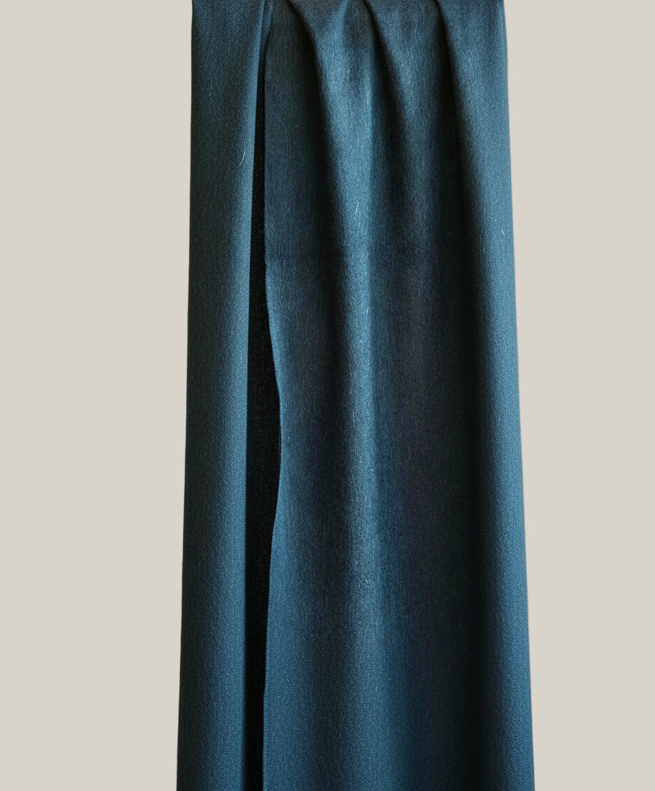 Close up of a deep navy pure cashmere scarf highlighting its fine brushed texture and rich blue tone. Soft and lightweight, crafted from premium Inner Mongolian cashmere by Duo Plus