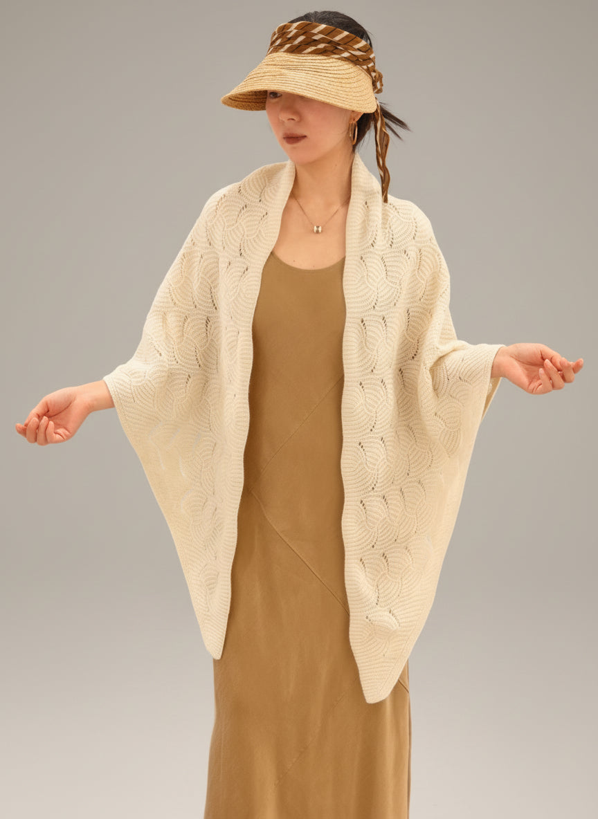 Ivory yak wool blend shawl styled on model, demonstrating size, drape, and elegant open knit texture.