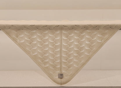 Yak wool blend shawl displayed in a triangular drape, showing the airy knit pattern and lightweight construction.